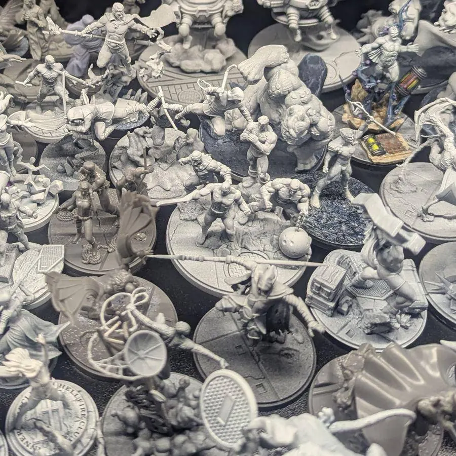 A pile of unpainted grey miniatures