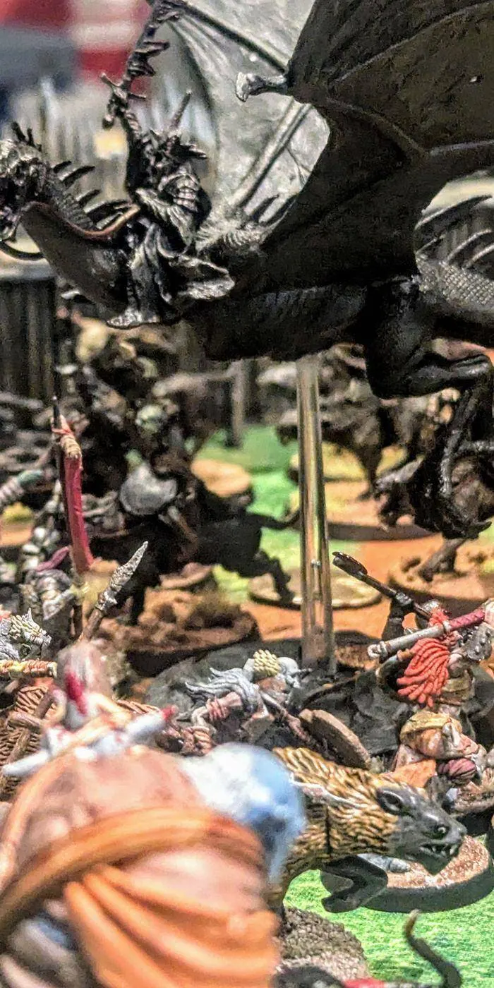 The painted army in battle under a dragon