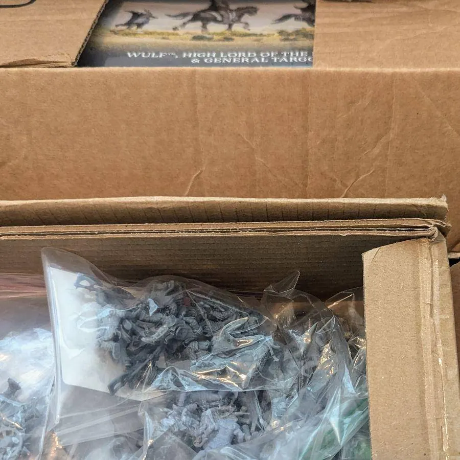 A box of unbuilt kits and sprues